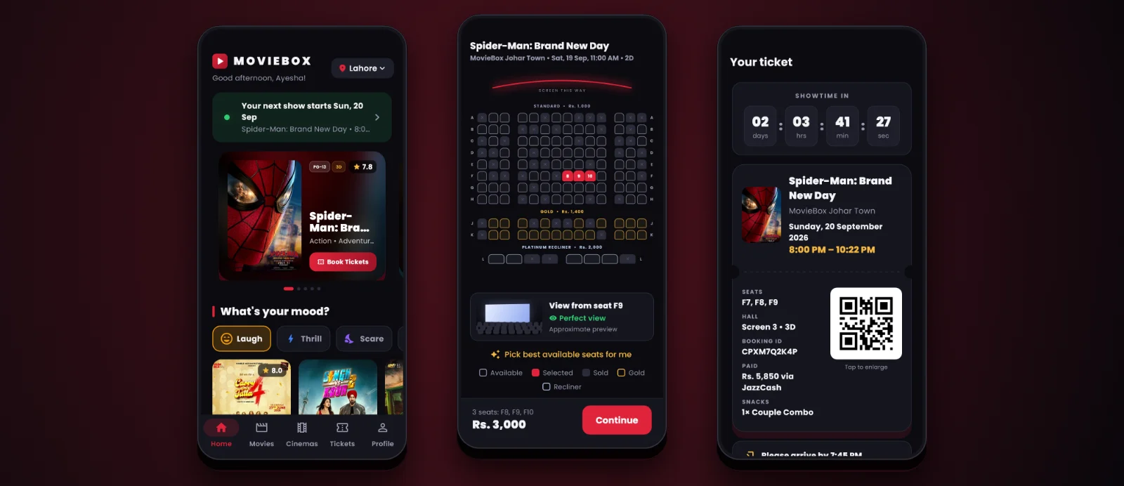 Three MovieBox app screens: the home feed with a featured film, the cinema seat map with three seats selected, and a QR e-ticket with a countdown to the show.